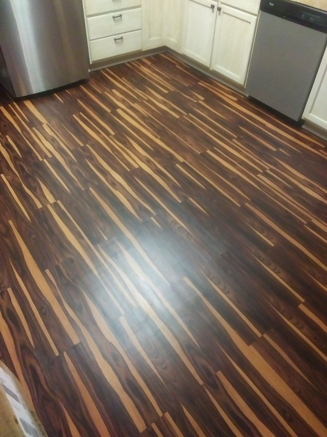 Renovated kitchen with new flooring
