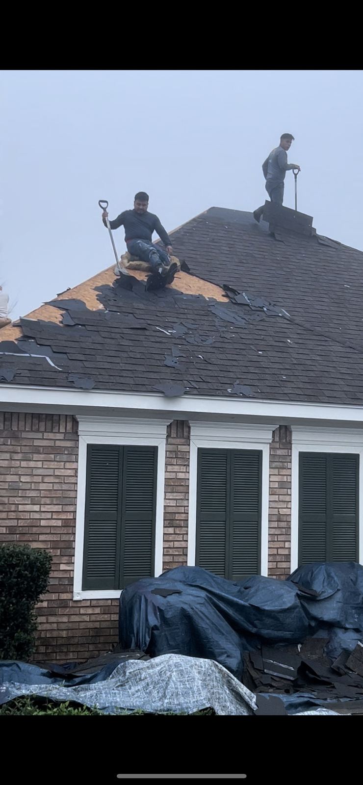 Roof tarping after a storm